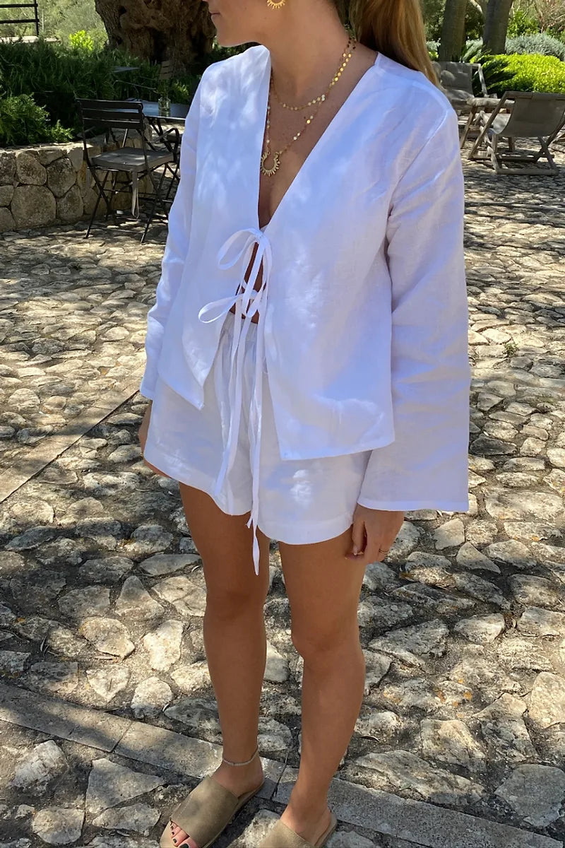 Alice - Långärmad blus med rosettknäppning