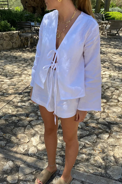Alice - Långärmad blus med rosettknäppning