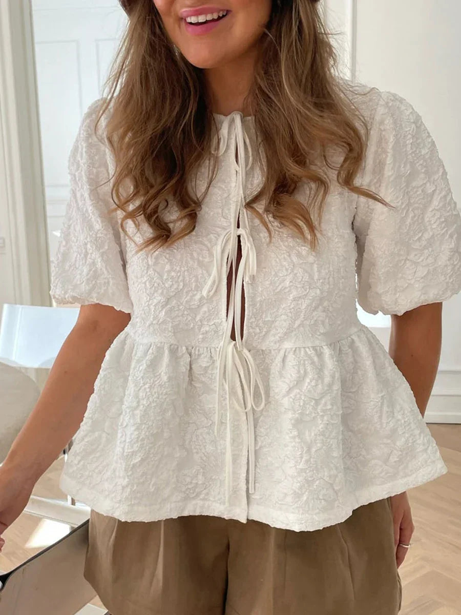 Ruth - Texturerad blus med rosett
