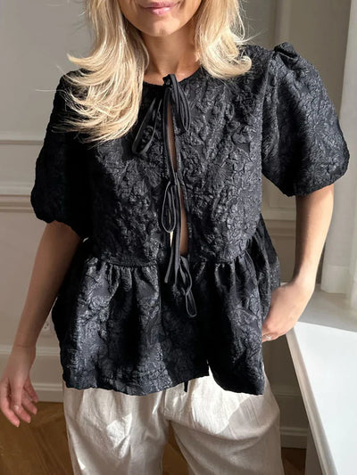Ruth - Texturerad blus med rosett